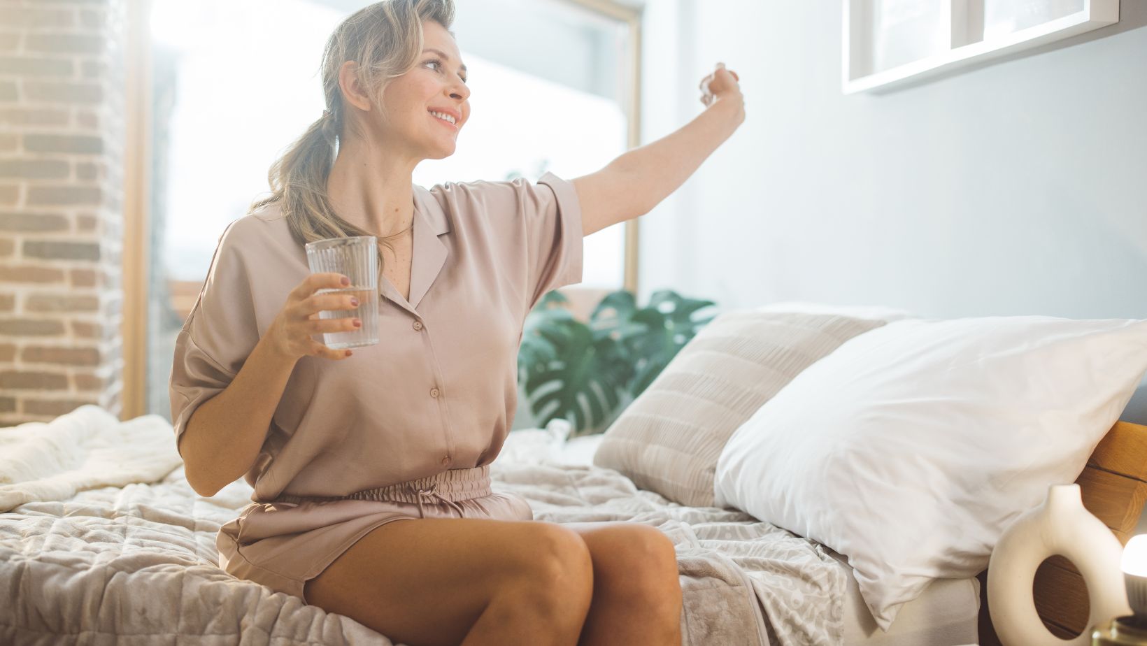 woman getting out of bed